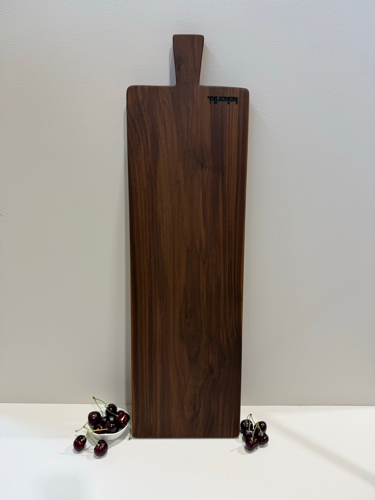 The Plank Serving Board — long black walnut serving plank